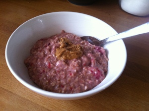 Porridge with raspberries and almond butter.
